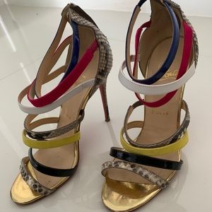 Christian Louboutin red bottoms, strappy heels